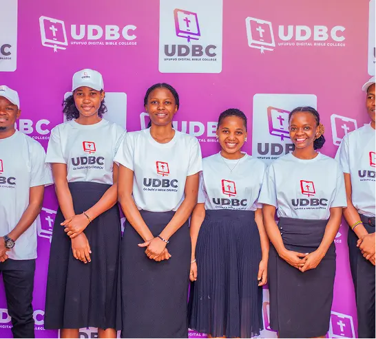 UDBC students standing together at a community event